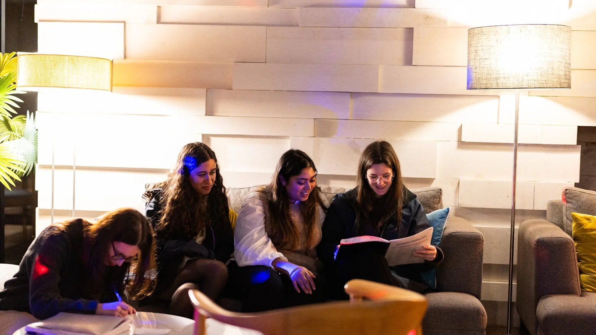 Man presenting beside a screen with a “City as a Platform” slide, gesturing with his hands while speaking.